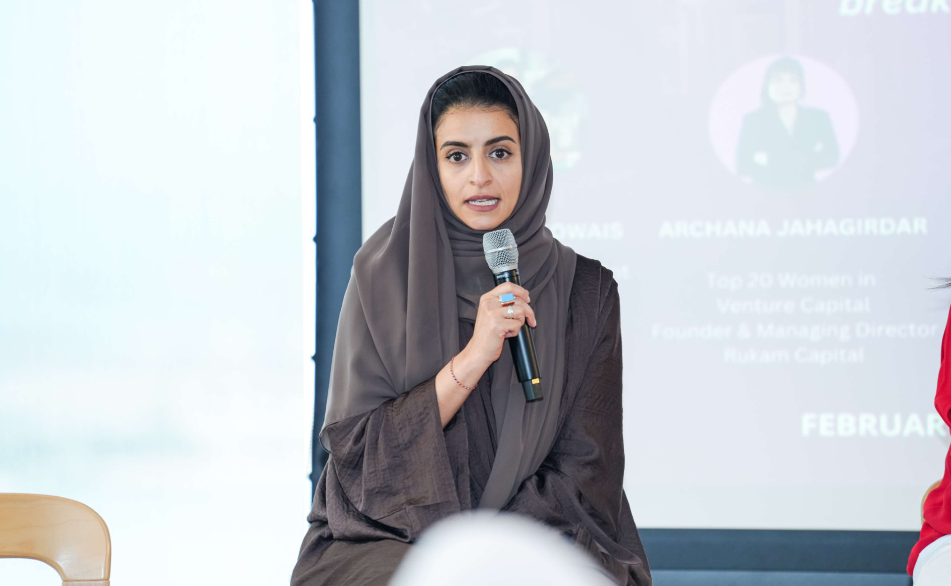 Speaker addressing the Encubay Wealth Shift panel audience