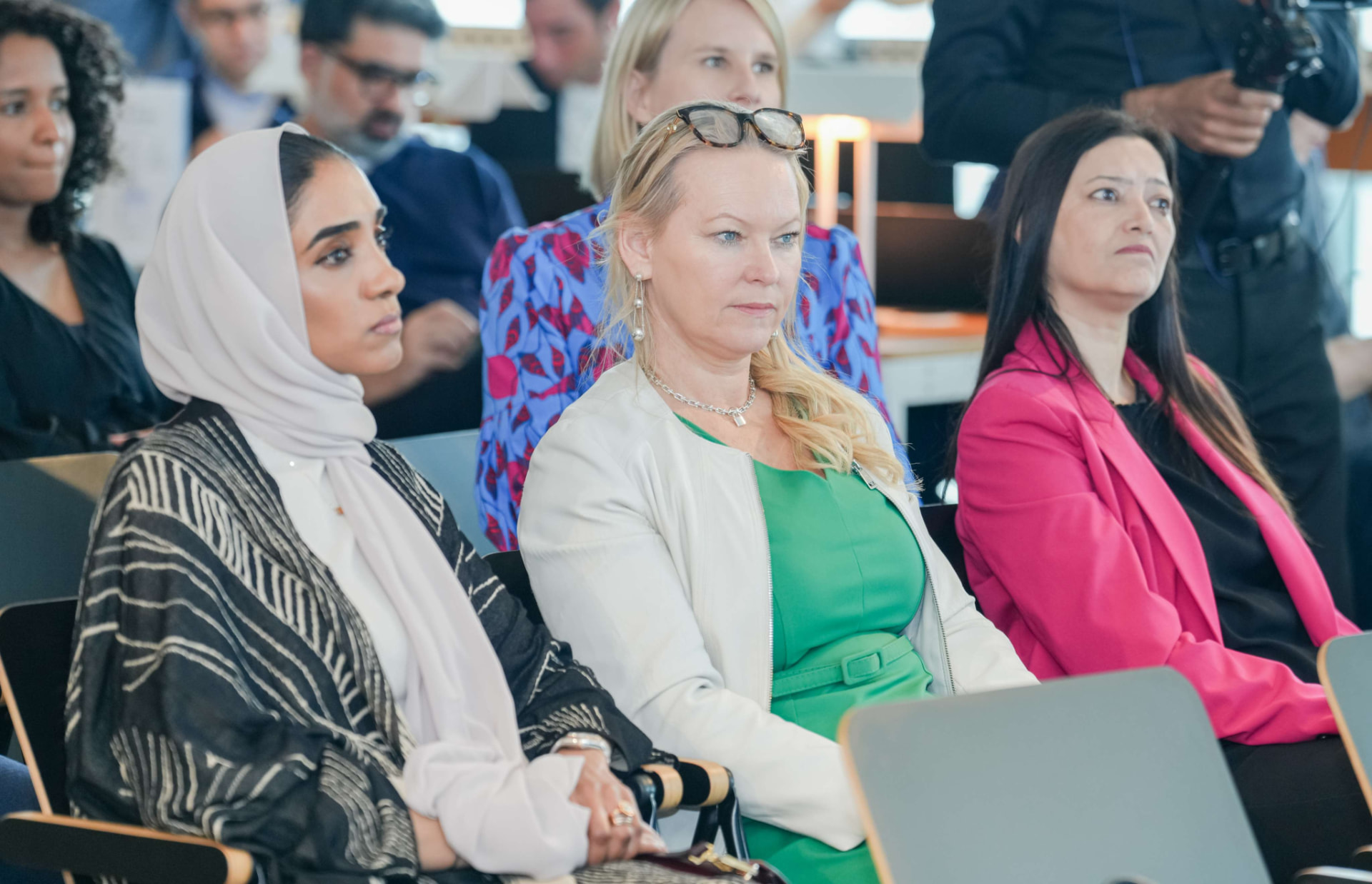 Founders and investors seated in the audience